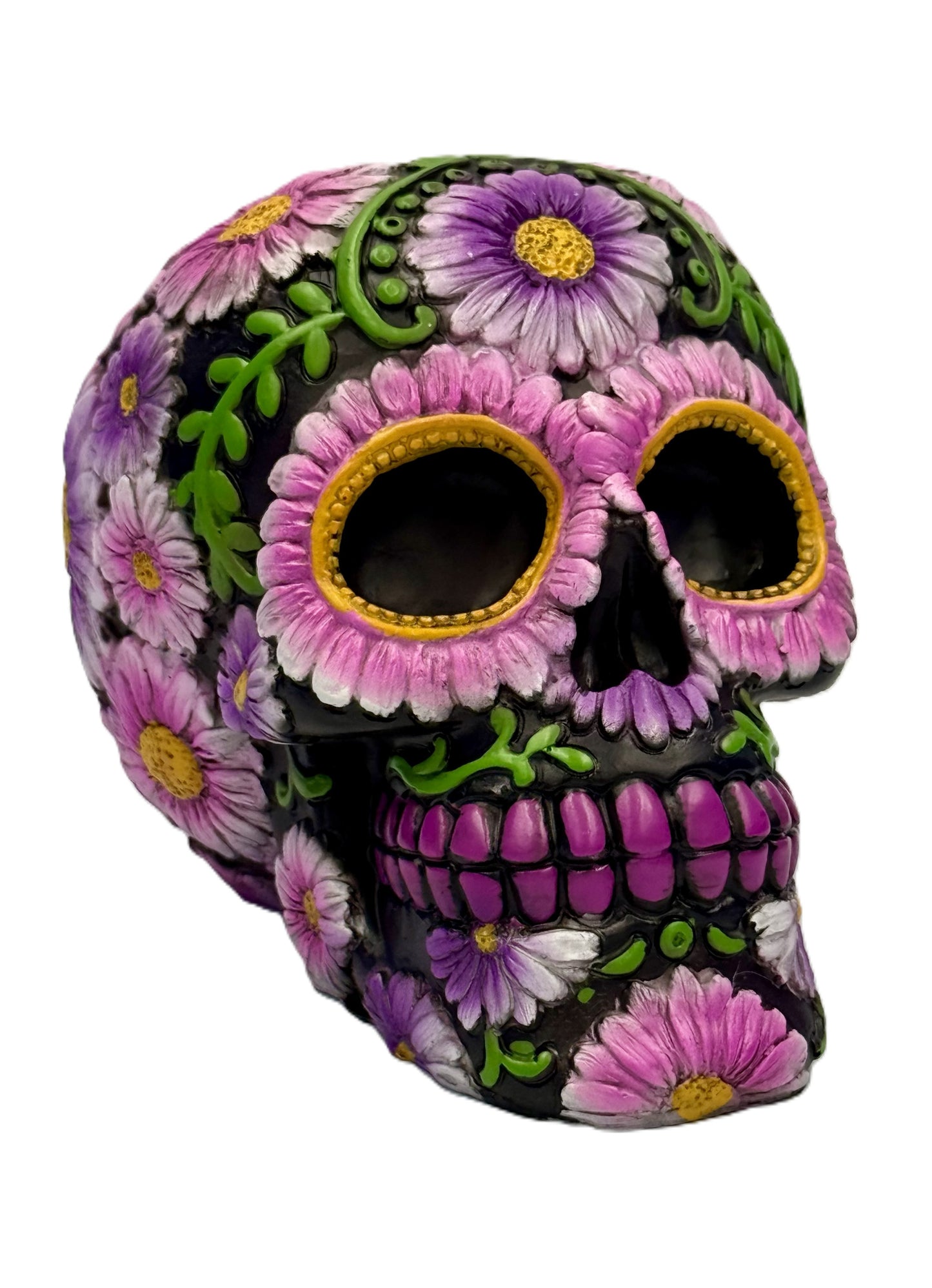 Front angled view of black sugar skull coin bank with pink and purple floral details
