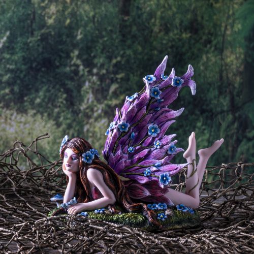 Lifestyle view of fairy placed in a natural setting to showcase display appeal
