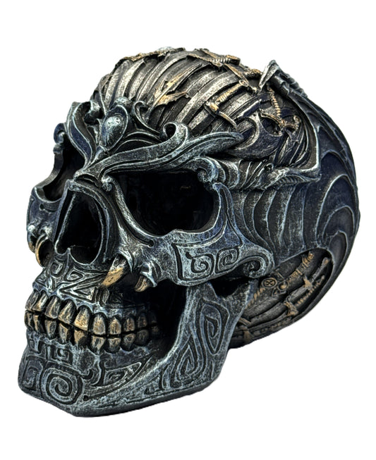 Front angled view of gothic sword skull sculpture featuring ornate carvings and metallic distressed finish
