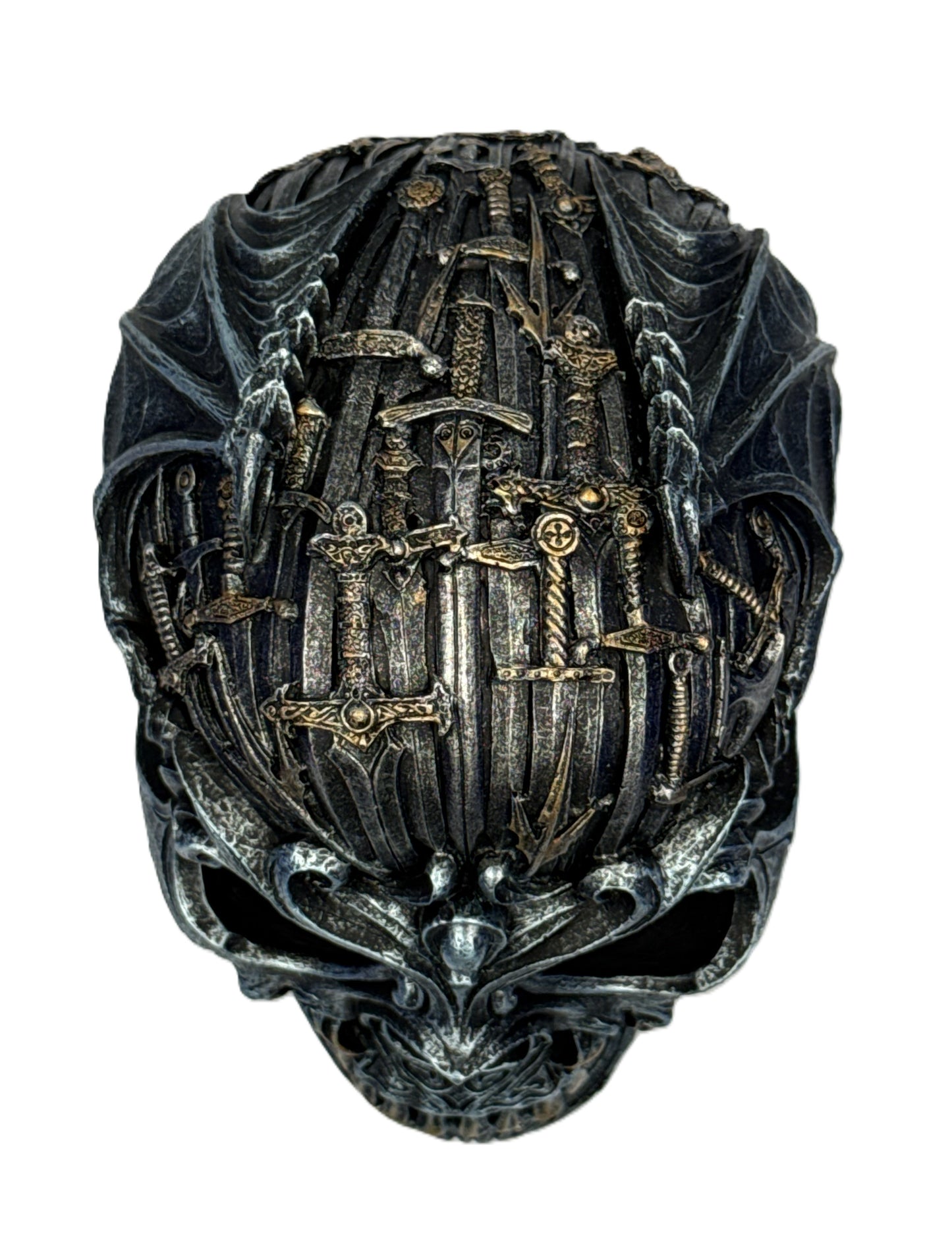 Top view of skull decor displaying layered swords and detailed gothic textures across the crown
