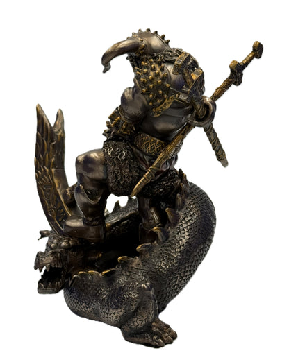 Back angled view of Thor Viking warrior statue showing crossed swords and dragon body base with textured scales
