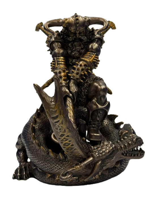 Front view of Thor Norse god statue standing over dragon with sword and detailed Viking armor in cold cast bronze finish
