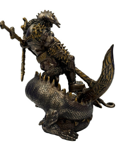 Side view of Viking Thor statue standing on dragon with sword and shield details in antique bronze cold cast finish
