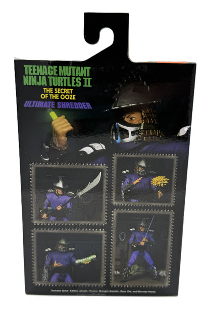 Back of the NECA Ultimate Shredder action figure packaging featuring movie-inspired photography and included accessories.