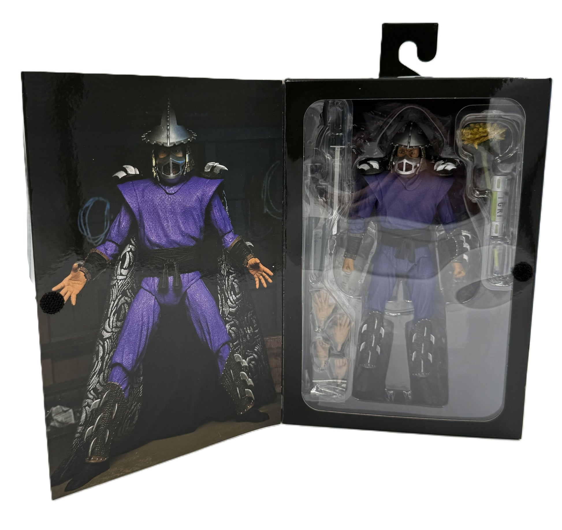 NECA Ultimate Shredder action figure displayed inside the opened collector window box with accessories.