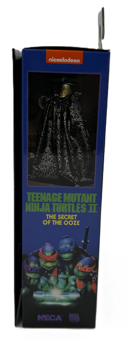 Side panel of the NECA Ultimate Shredder packaging featuring Teenage Mutant Ninja Turtles II The Secret of the Ooze artwork.
