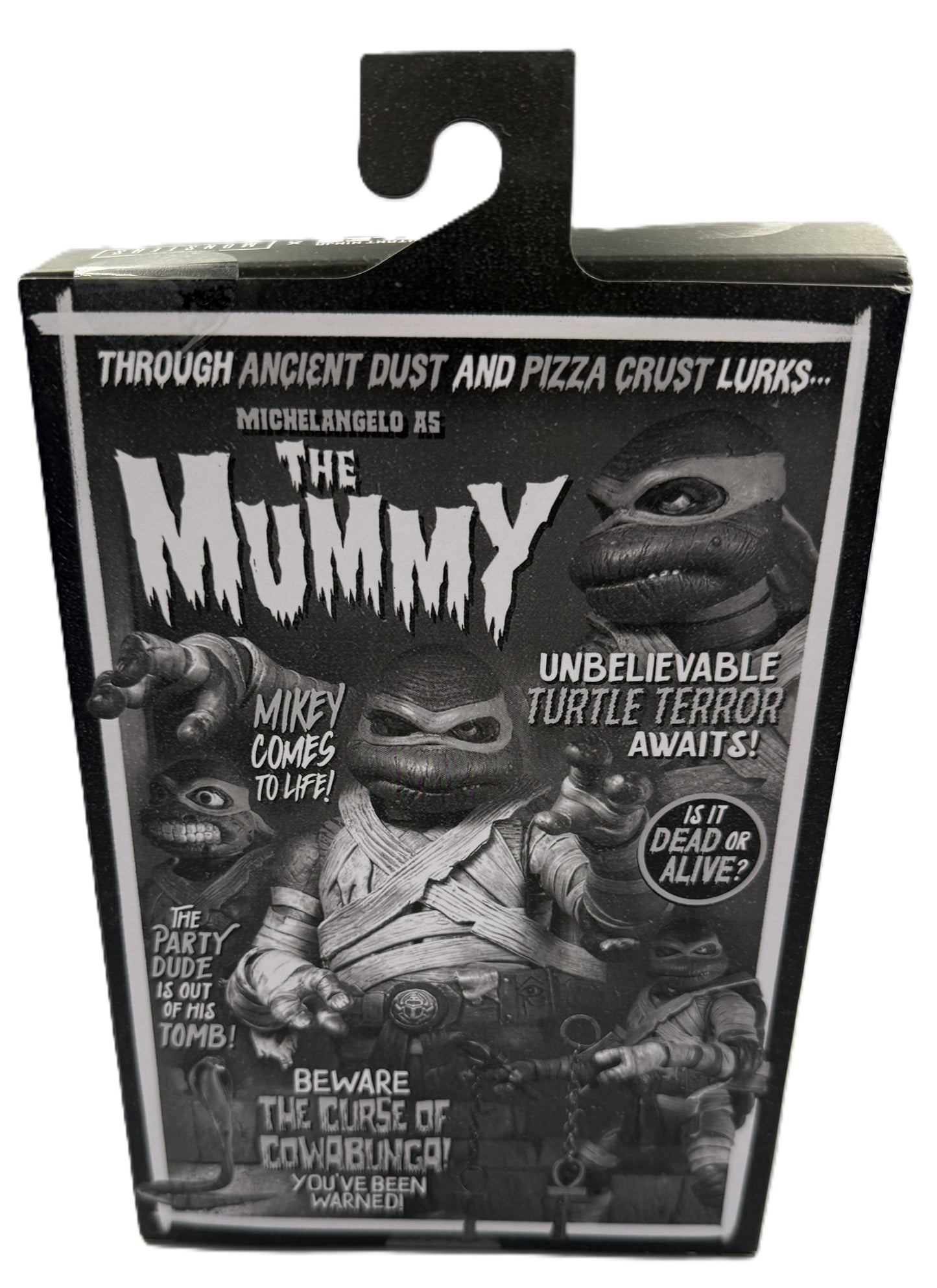 Back of TMNT Universal Monsters Michelangelo as The Mummy packaging featuring vintage monster artwork
