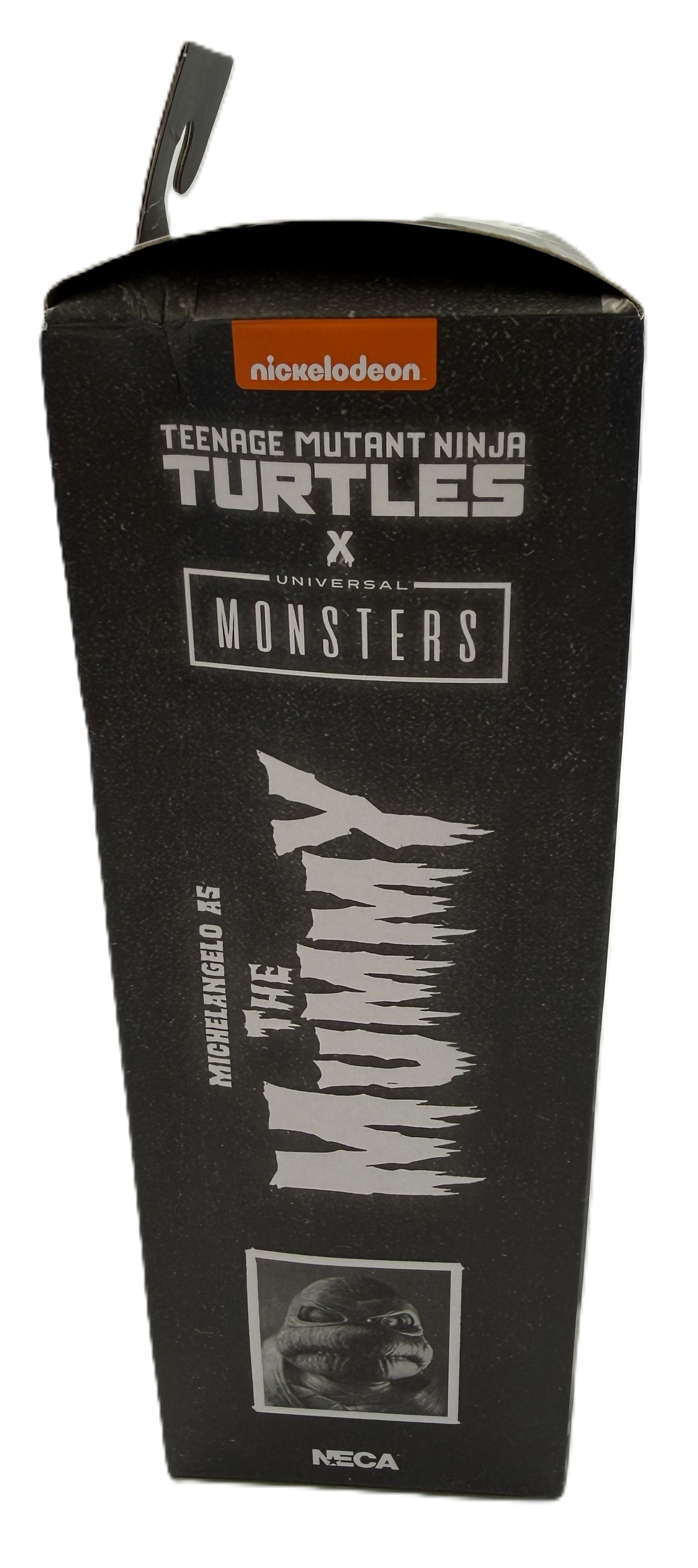 TMNT Universal Monsters series character panel shown on Michelangelo Mummy figure packaging
