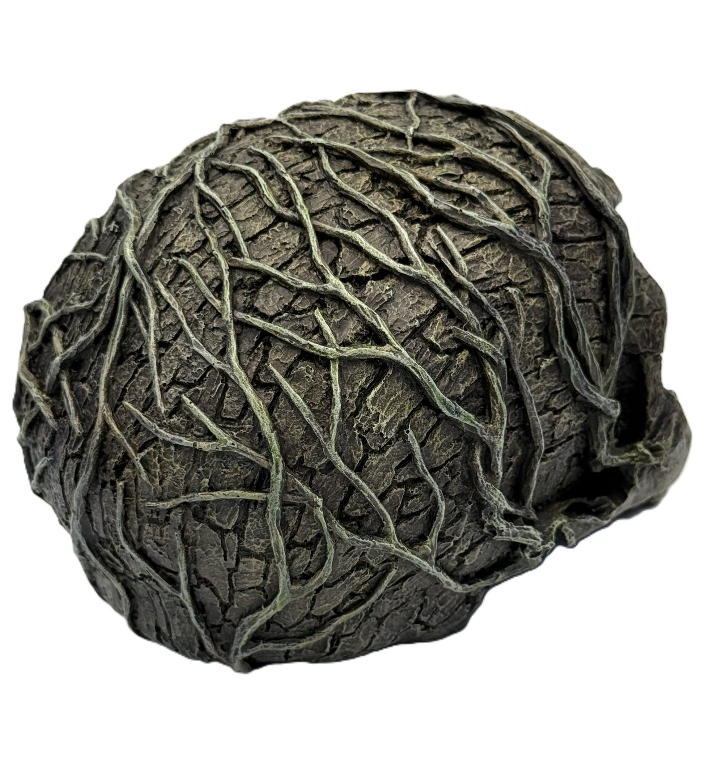 Right side view of tree skull sculpture highlighting aged bark texture and organic vine detailing
