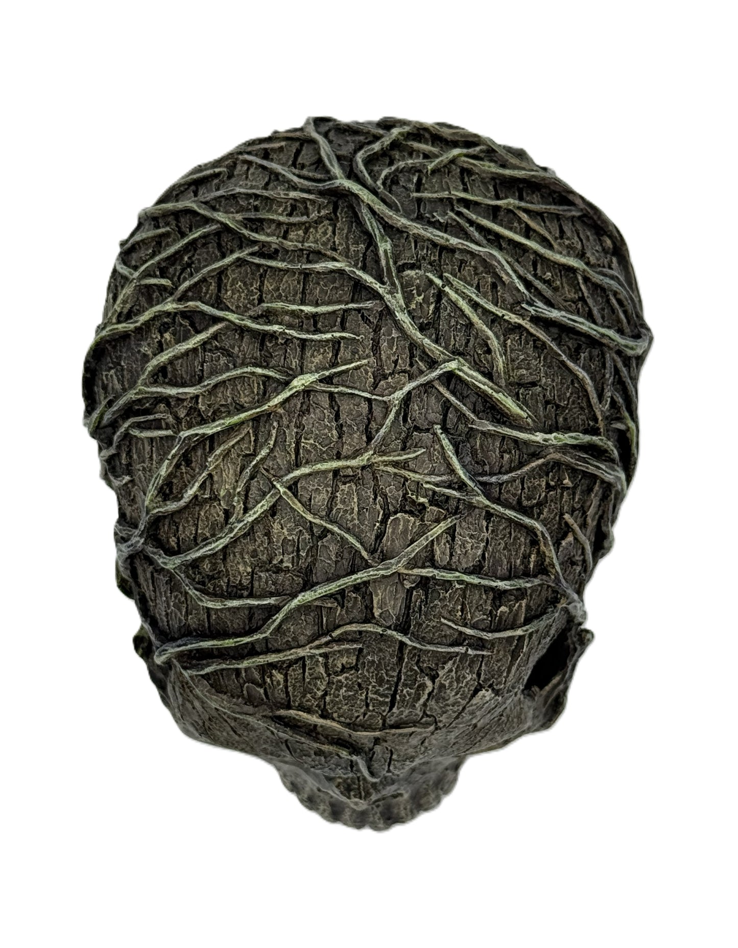 Top rear view of skull statue emphasizing layered bark textures and winding vine design

