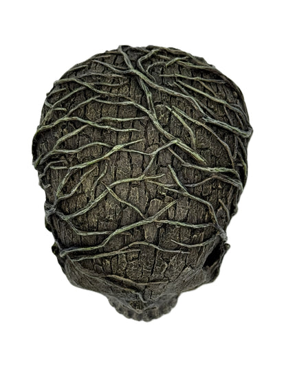 Top rear view of skull statue emphasizing layered bark textures and winding vine design
