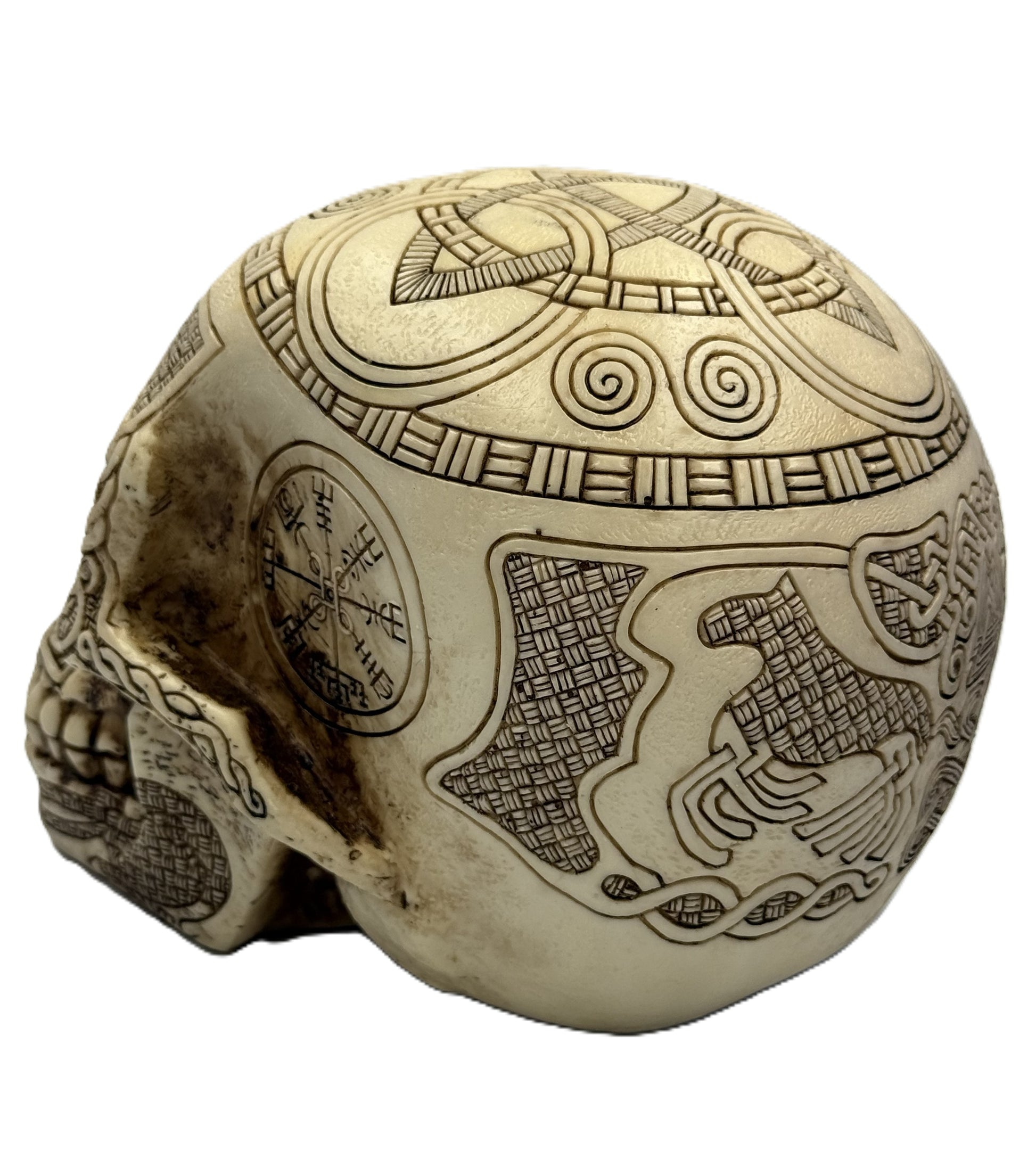Top angled view of Norse skull decor showing triquetra knot design and detailed carved patterns
