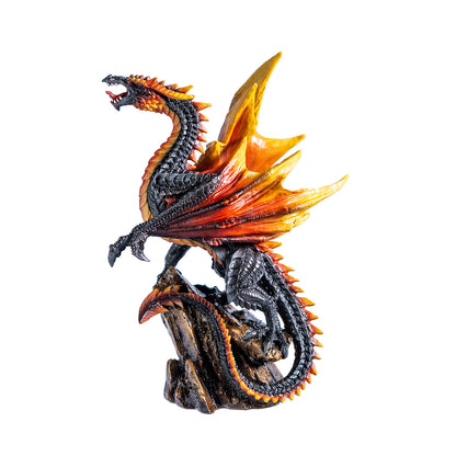 Front view of black and fire colored Vulcan dragon figurine with wings spread
