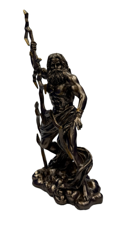 Angled front view of Zeus statue wielding lightning bolt with detailed beard, muscular torso, and bronze finish
