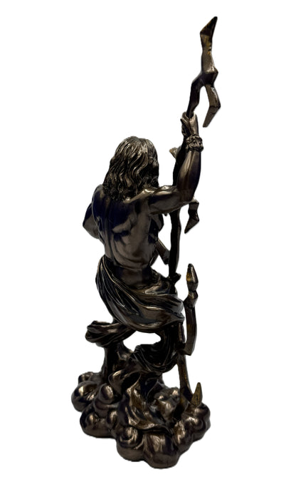 Rear angled view of Zeus figure showing sculpted anatomy and lightning bolt detail in bronze collectible statue
